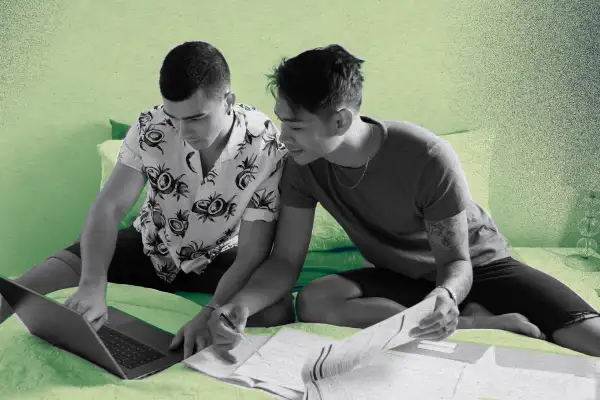Young couple verify mortgage papers and documents
