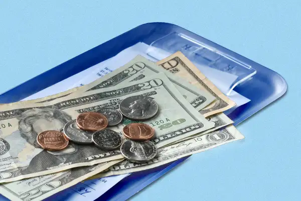 Cash tip on top of restaurant bill